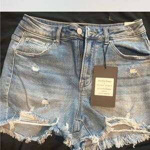 Blue Jean Shorts with Distressed Details and Raw Hem